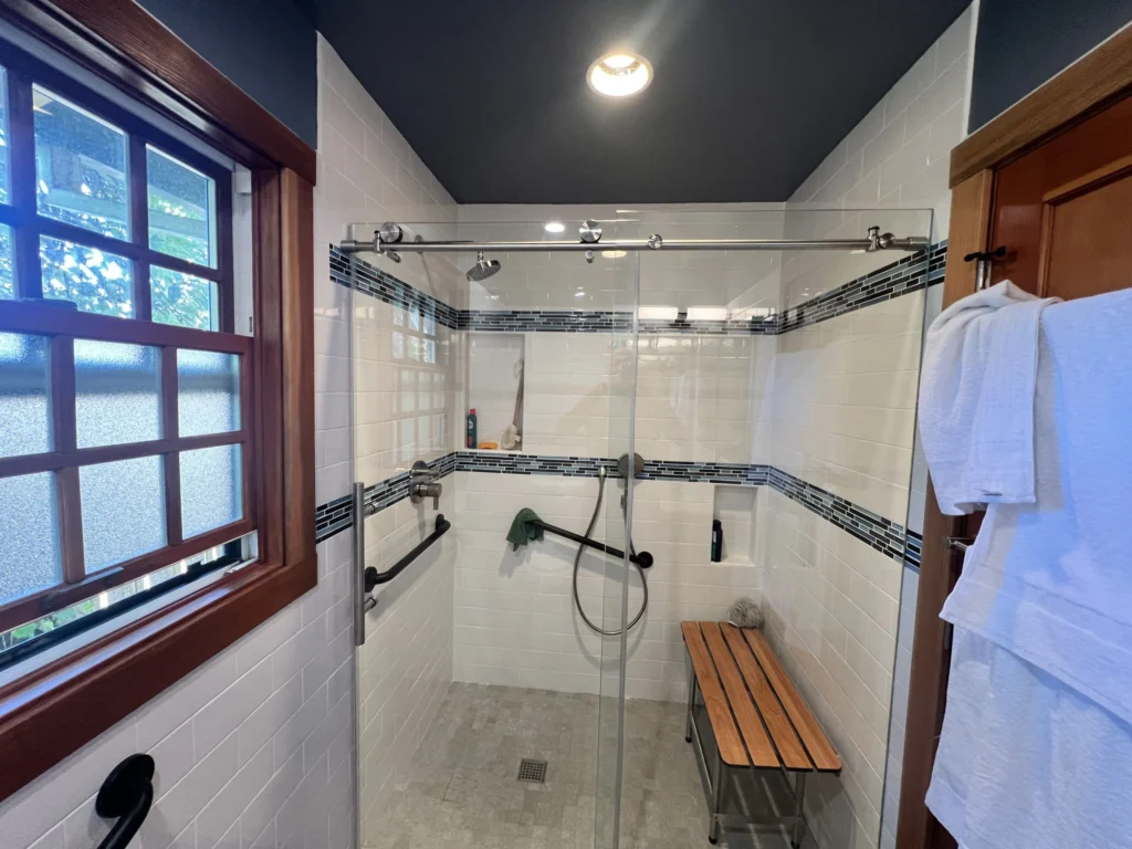 Bathroom remodel: Accessible bathroom with a walk-in shower, teak bench and craftsman window, Mill Valley
