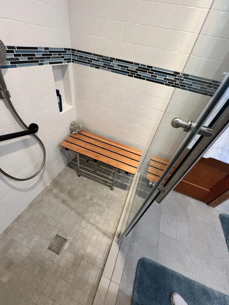 Bathroom remodel: Curbless shower floor with teak bench and hand shower, Mill Valley