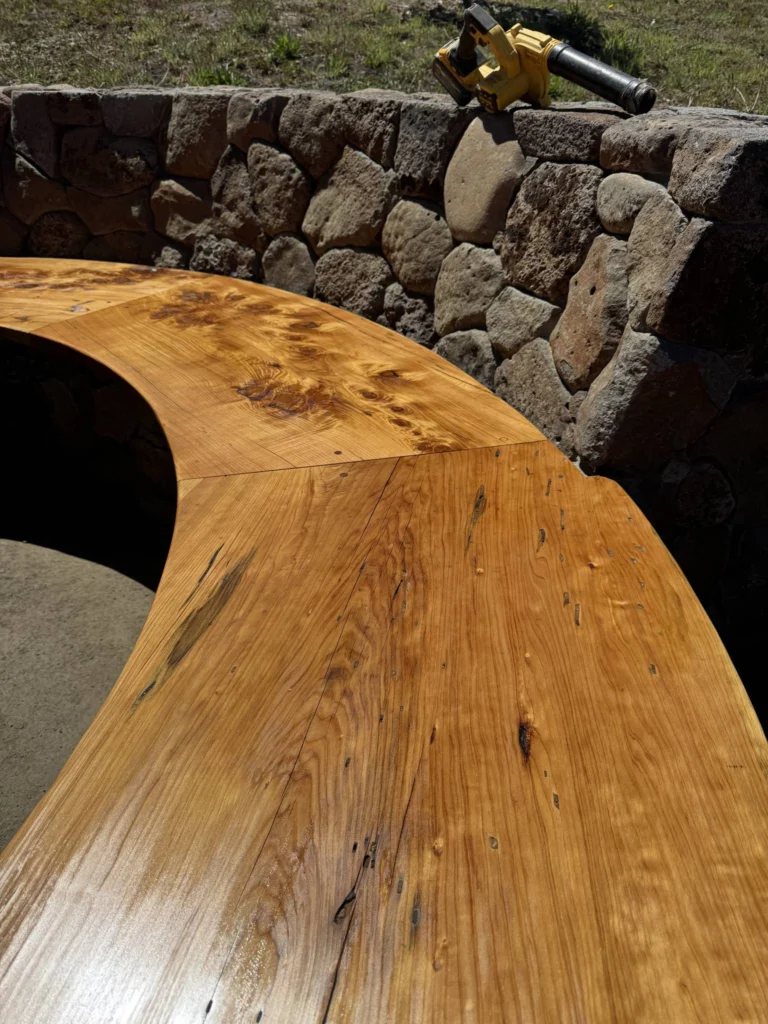 Hardscape: Curved slab bench top on a stone wall, Bolinas