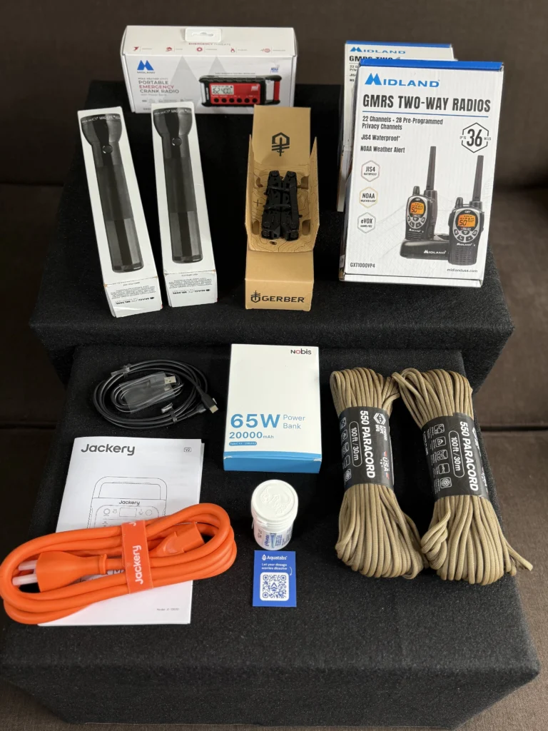 Emergency preparedness cache: Shared items box contents, 2- Maglight flashlights, 4 walkie talkies, Gerber multitool, 65w po…