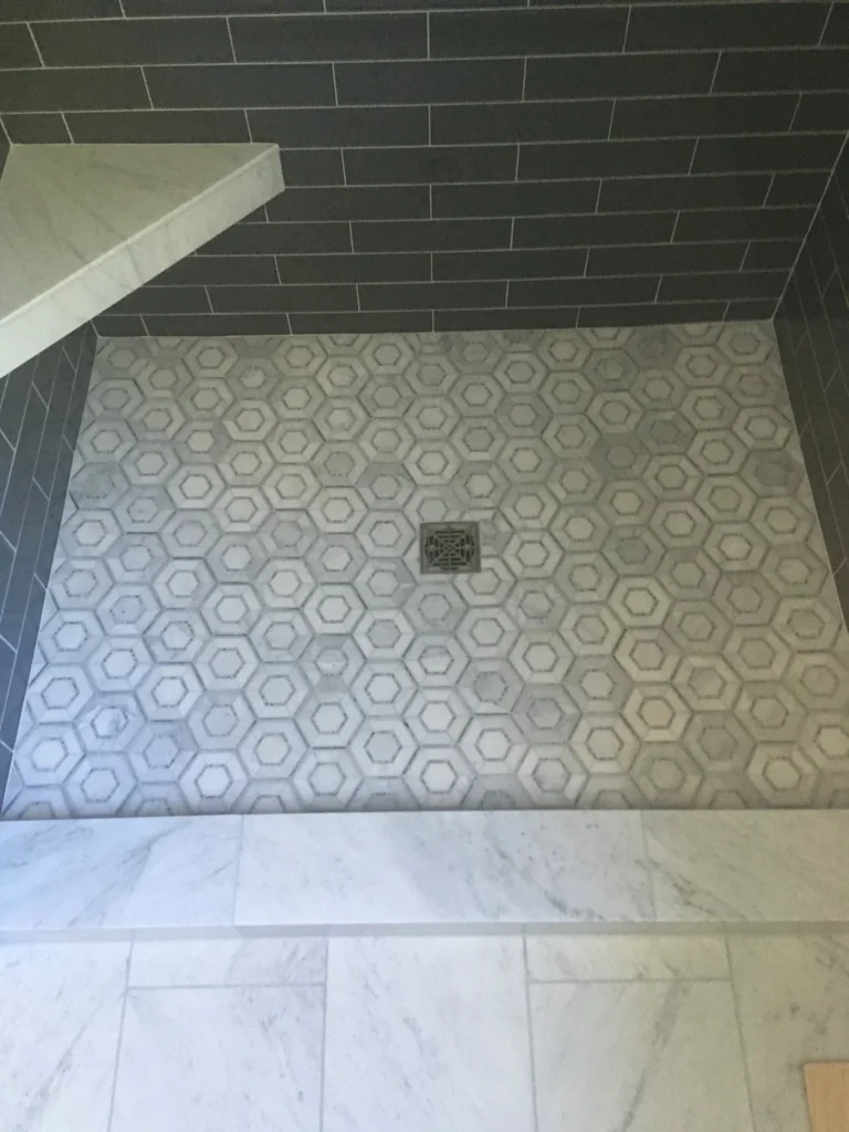 Bathroom remodel: Marble hex shower floor and grey subway tile, Tiburon