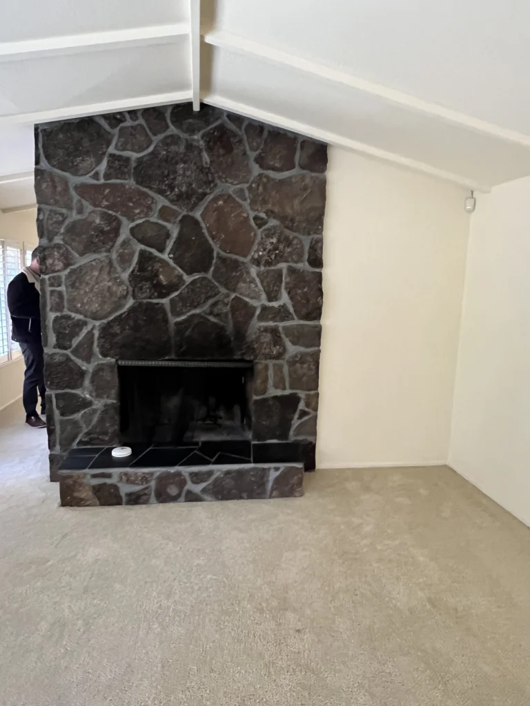 Whole-house remodel: Dark stone fireplace before the remodel, Sleepy Hollow